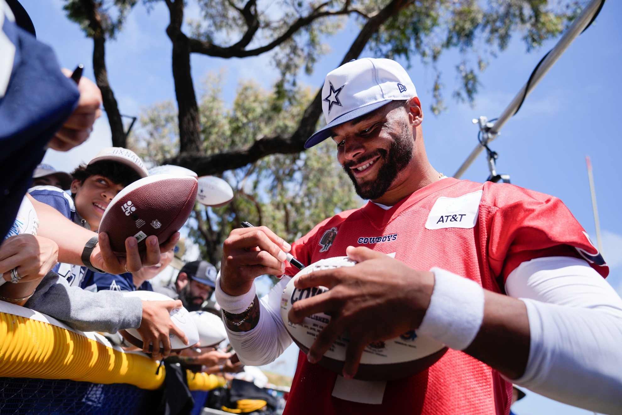 DakPrescott signing autographs