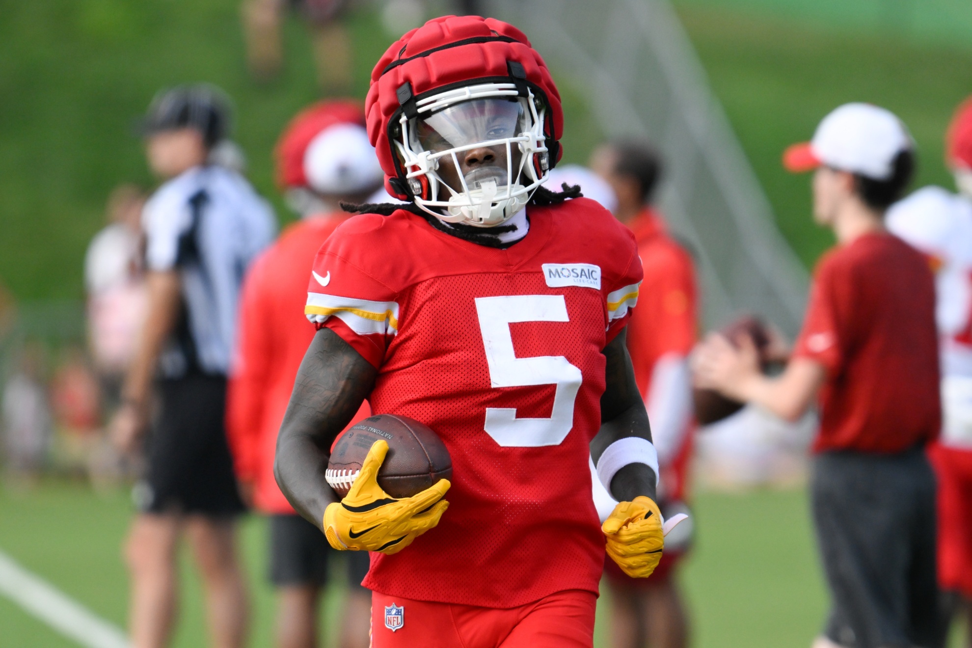 Kansas City Chiefs wide receiver Marquise Hollywood Brown carries after a catch during NFL football training camp Saturday, July 27, 2024, in St. Joseph, Mo. (AP Photo/Reed Hoffmann)