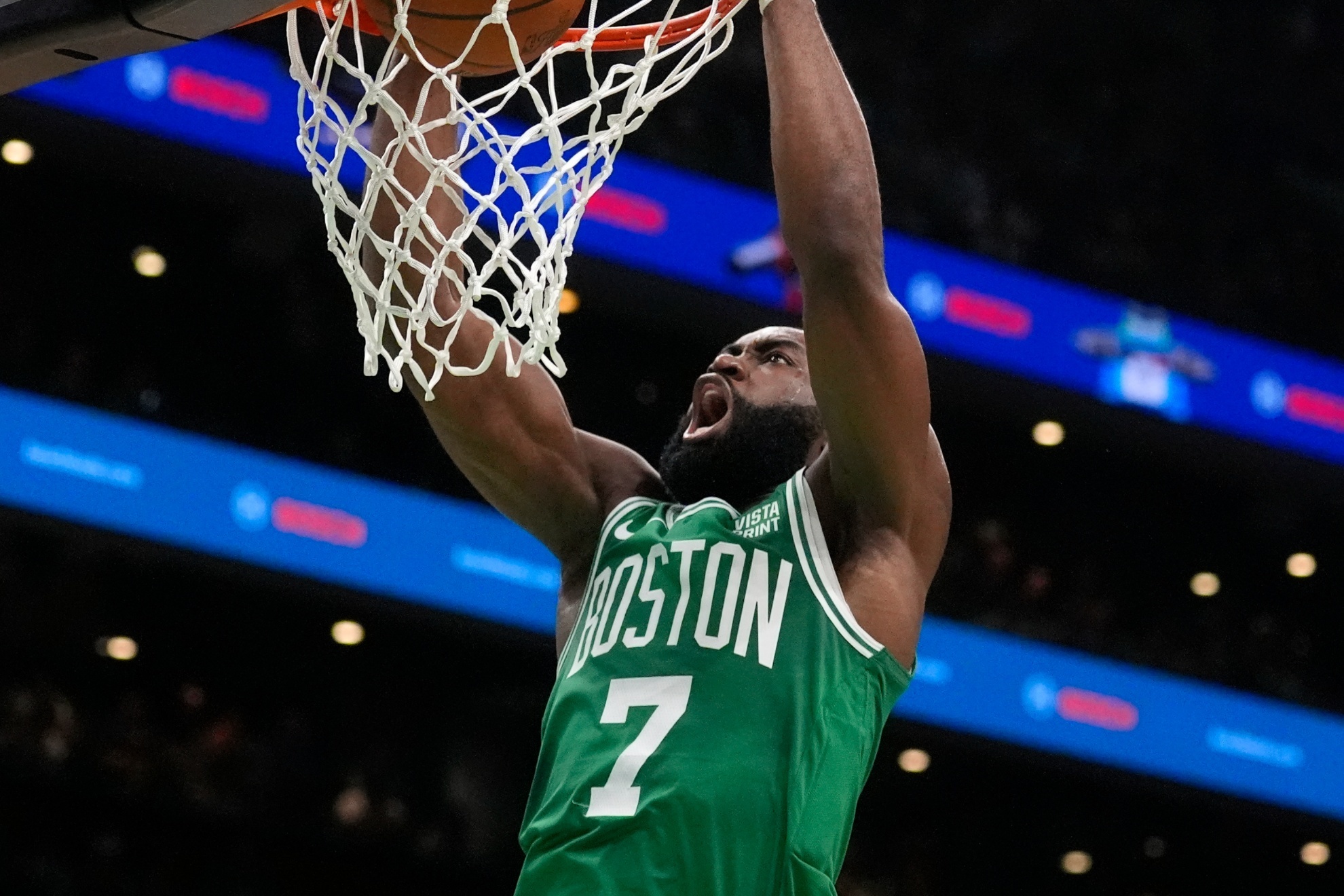 Boston Celtics guard Jaylen Brown dunks the ball during the first half of Game 5 of the NBA basketball finals against the Dallas Mavericks, Monday, June 17, 2024, in Boston. (AP Photo/Charles Krupa)