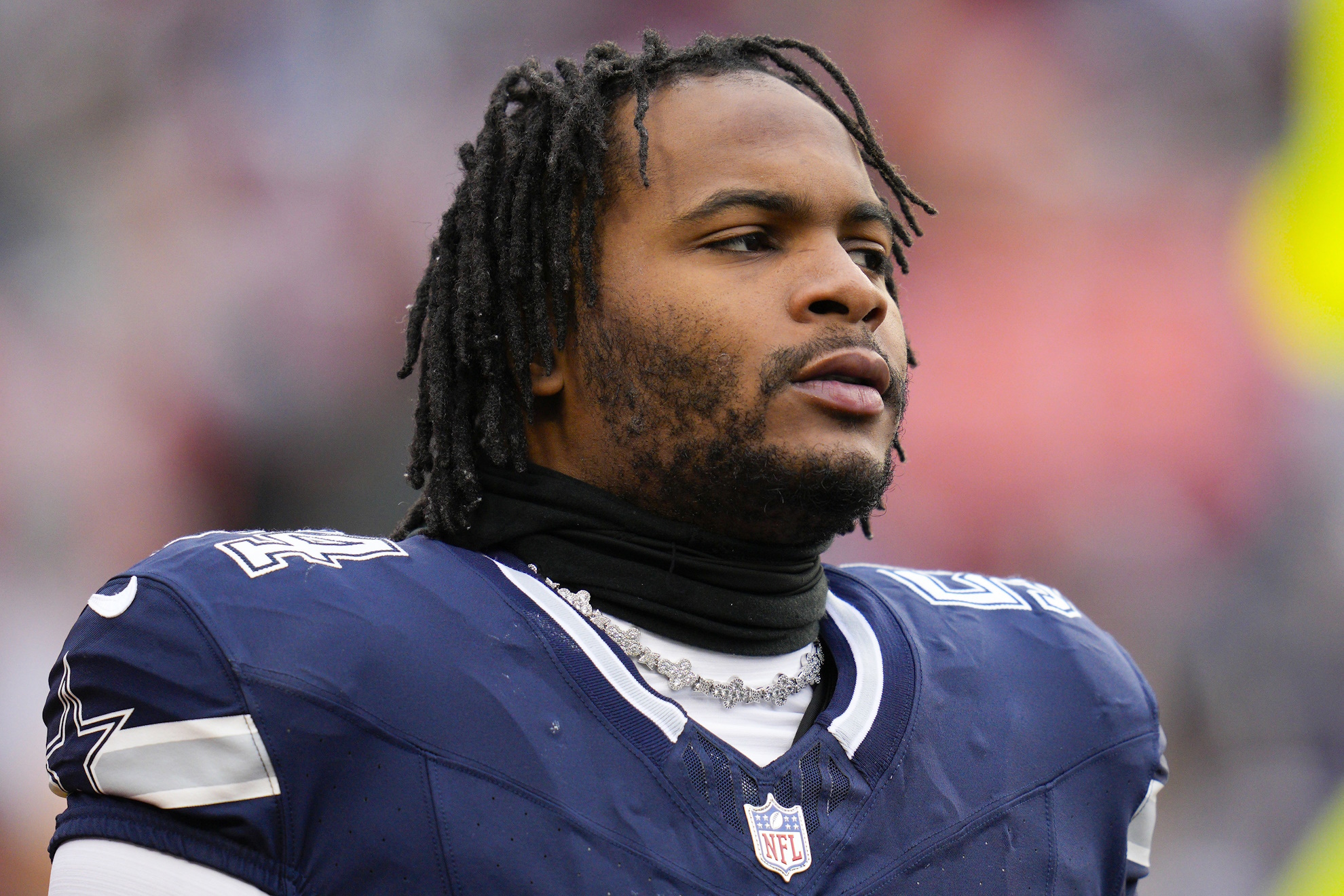 Dallas Cowboys defensive end Sam Williams looks on during warmups.