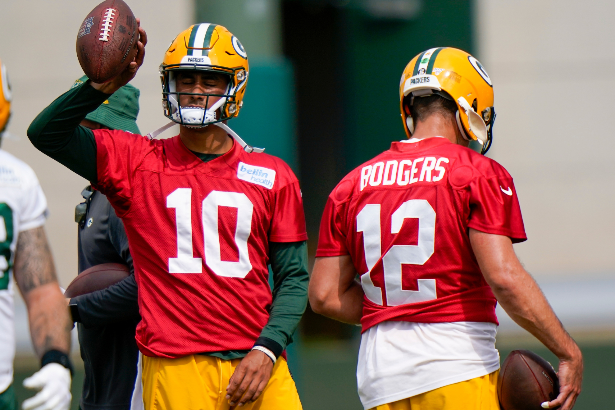 Jordan Love and Aaron Rodgers during a Green Bay Packers practice.