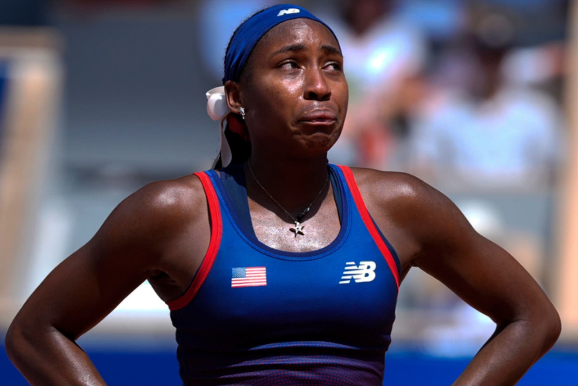 U.S. tennis star Coco Gauff cries after being defeated in Paris Olympics.