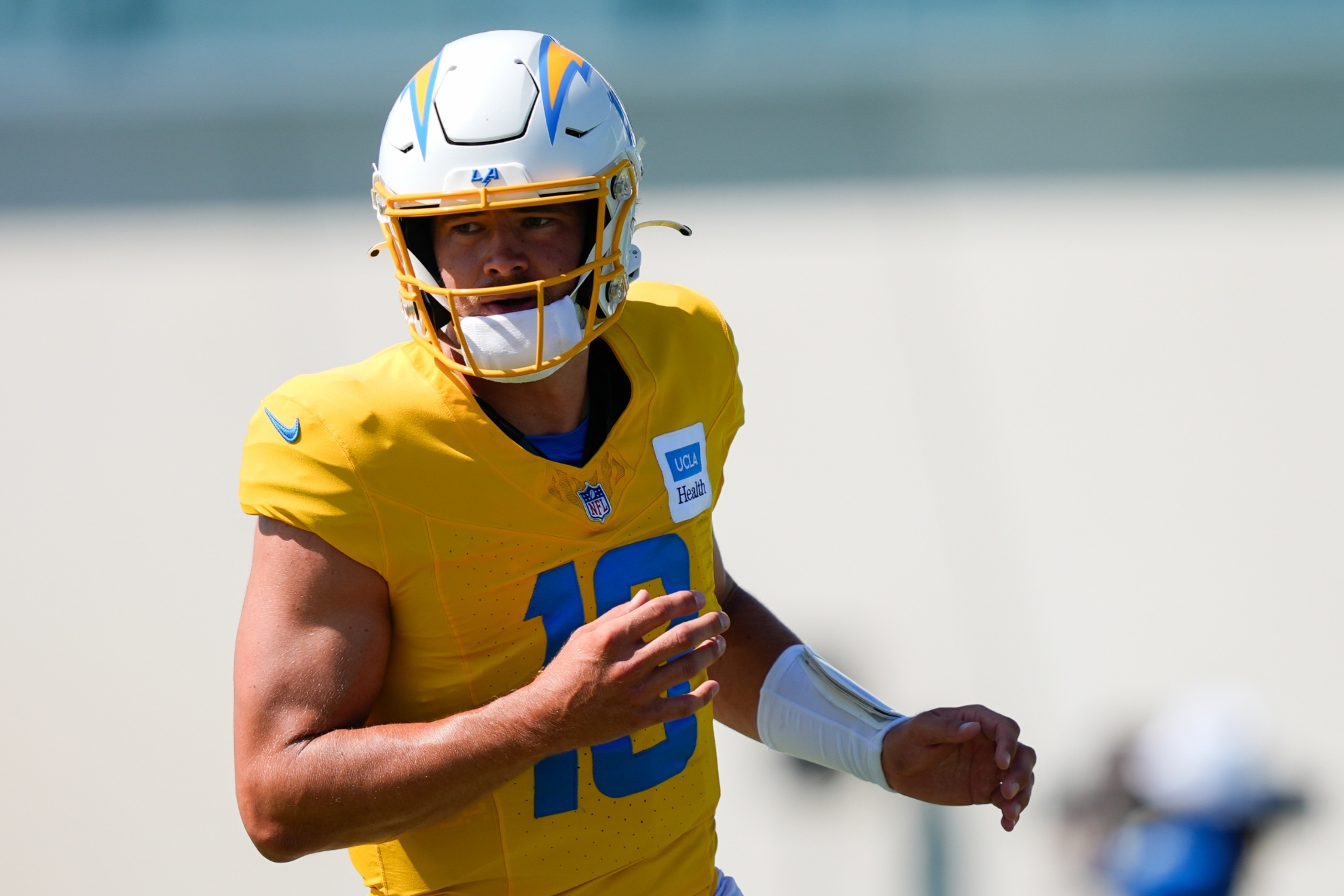 Los Angeles Chargers quarterback Justin Herbert runs drills during NFL football training camp Monday, July 29, 2024, in El Segundo, Calif. (AP Photo/Ryan Sun)