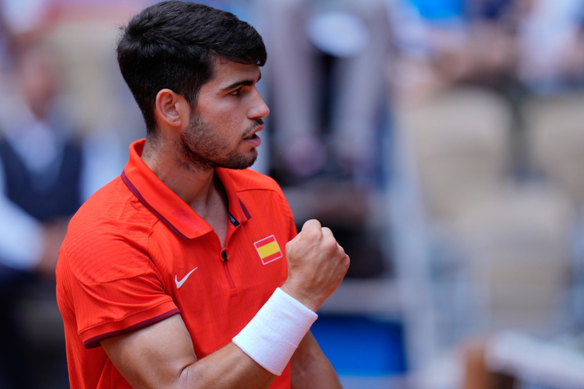 Carlos Alcaraz of Spain reacts after scoring a point against Felix Auger-Aliassime