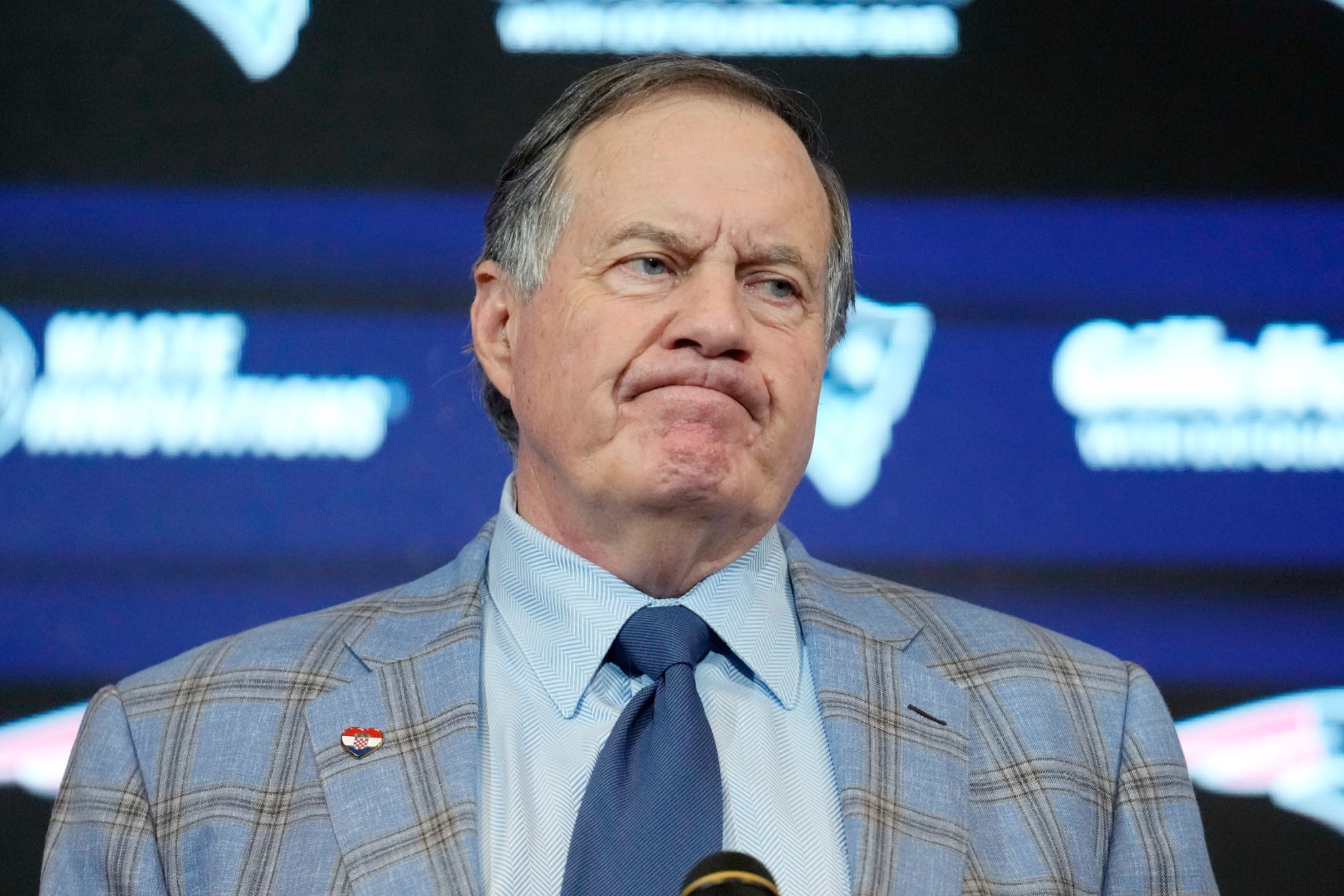 Former New England Patriots head coach Bill Belichick faces reporters during an NFL football news conference, Thursday, Jan. 11, 2024, in Foxborough, Mass., to announce that he has agreed to part ways with the team. (AP Photo/Steven Senne)