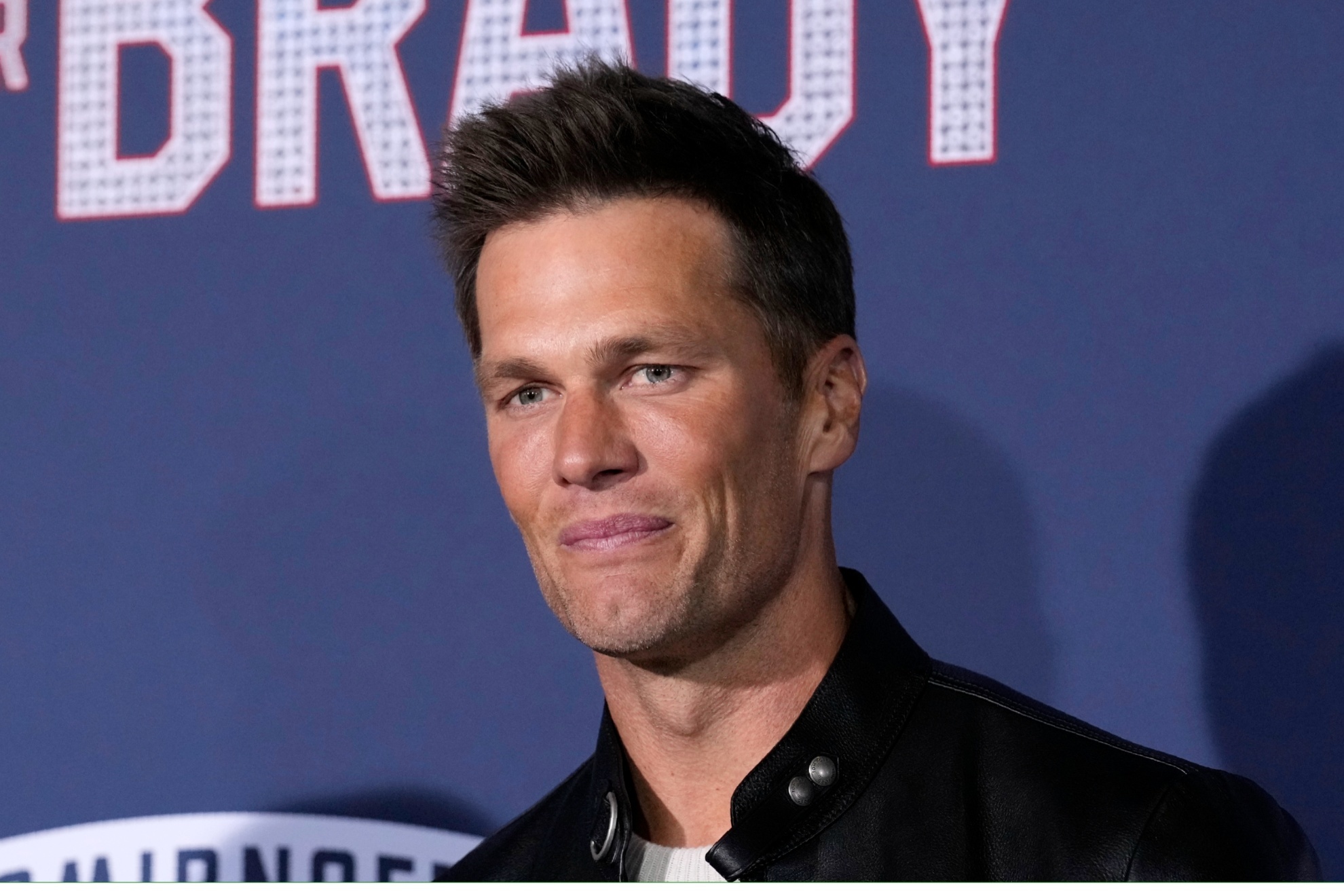 NFL quarterback Tom Brady, a cast member and producer of 80 for Brady, poses at the premiere of the film, Tuesday, Jan. 31, 2023, at the Regency Village Theatre in Los Angeles. (AP Photo/Chris Pizzello)