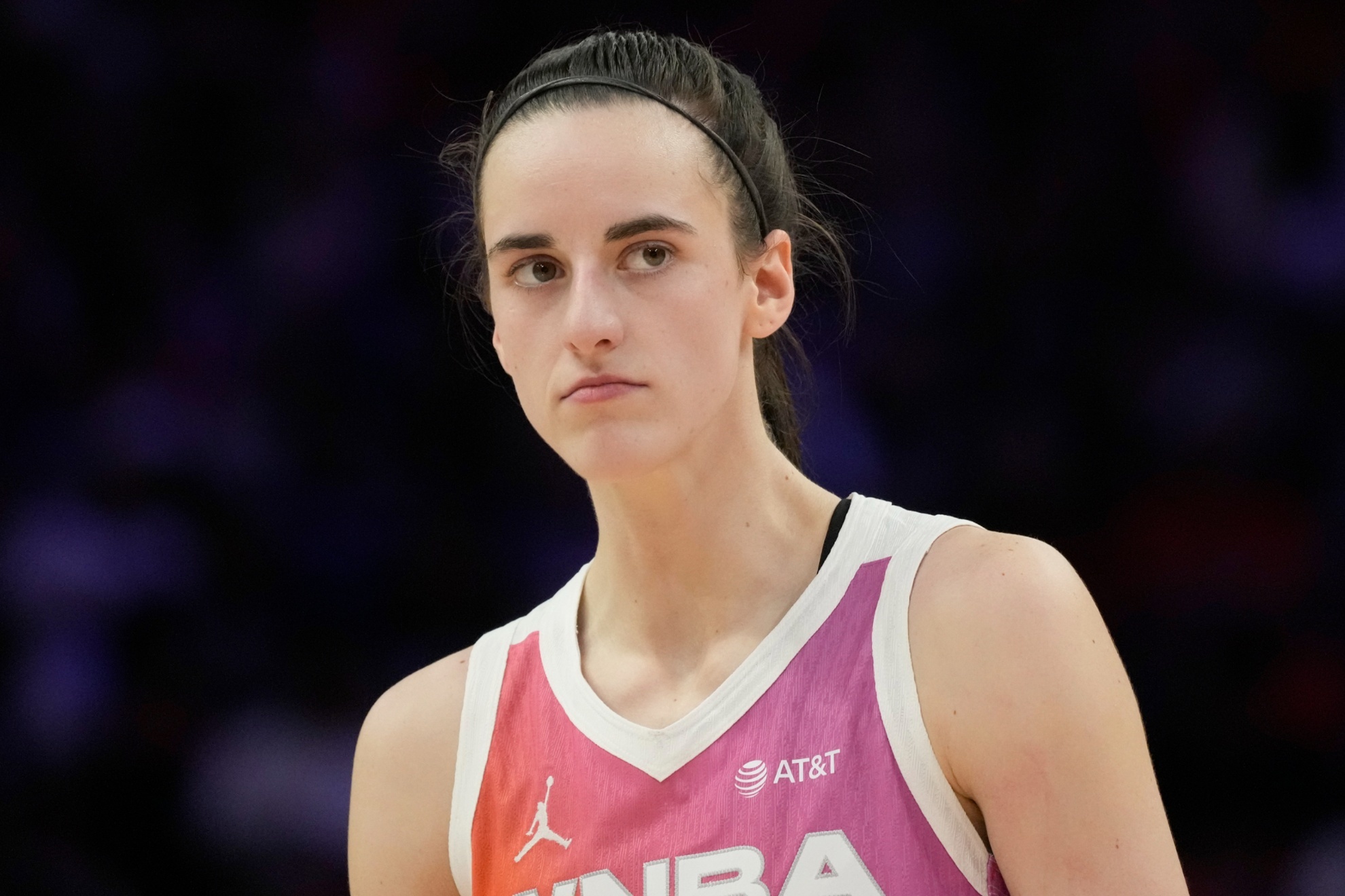 Caitlin Clark, of Team WNBA, pauses on the court during the first half of a WNBA All-Star basketball game against Team USA Saturday, July 20, 2024, in Phoenix. (AP Photo/Ross D. Franklin)