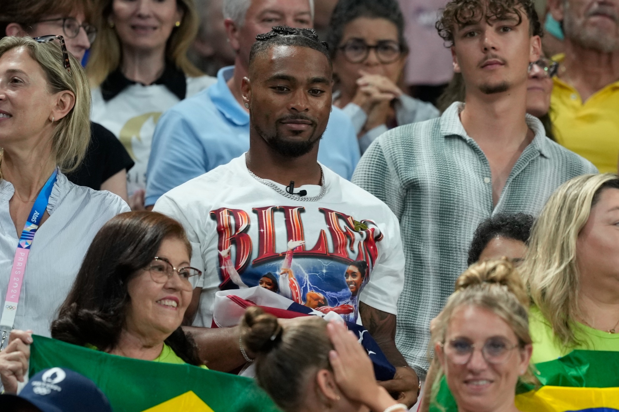 CORRECTS OWENS FIRST NAME U.S. gymnast Simone Biles husband Jonathan Owens watches during the womens artistic gymnastics team finals round at Bercy Arena at the 2024 Summer Olympics, Tuesday, July 30, 2024, in Paris, France. (AP Photo/Charlie Riedel)