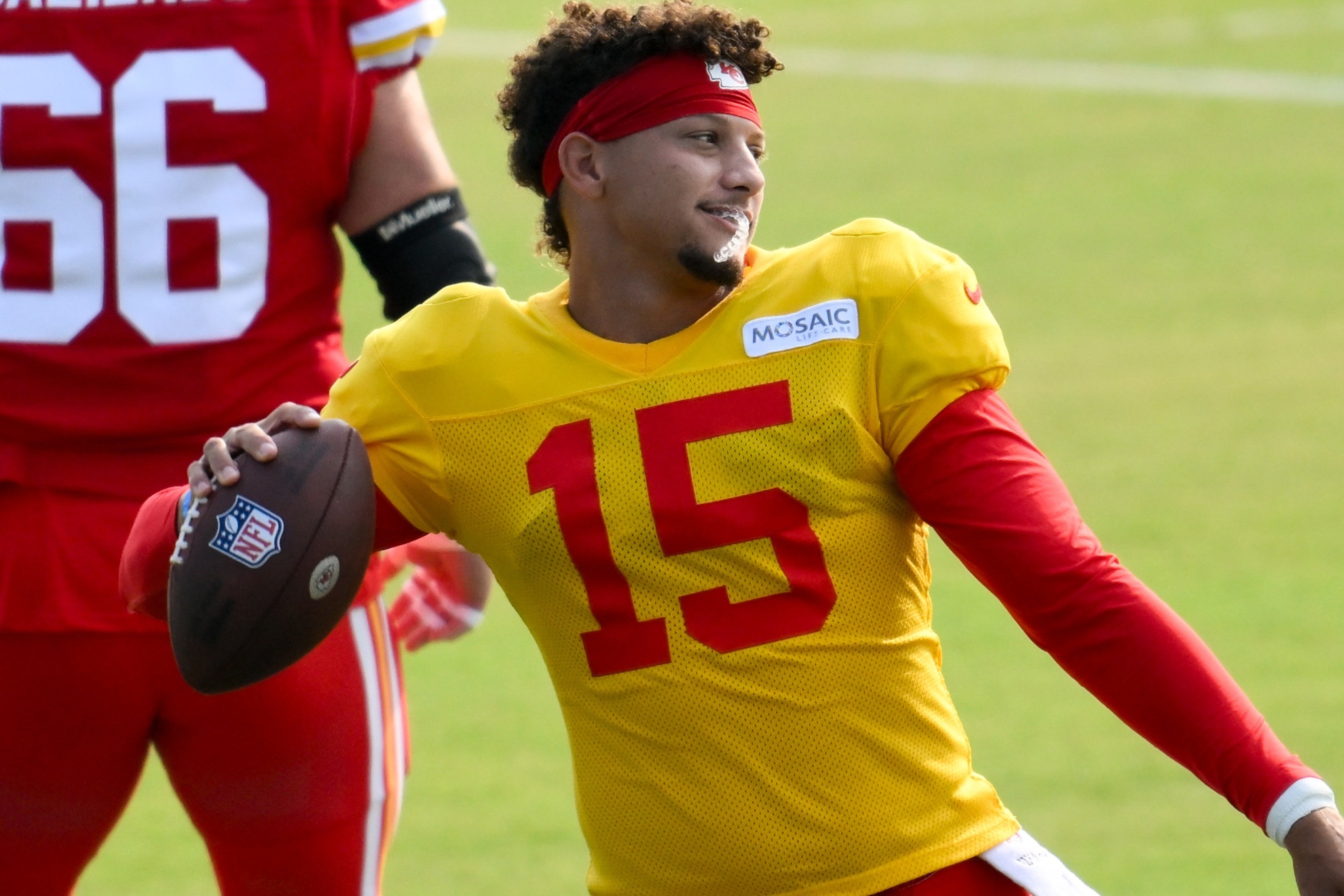 Kansas City Chiefs quarterback Patrick Mahomes throws a pass while warming up during NFL football training camp Saturday, July 27, 2024, in St. Joseph, Mo. (AP Photo/Reed Hoffmann)