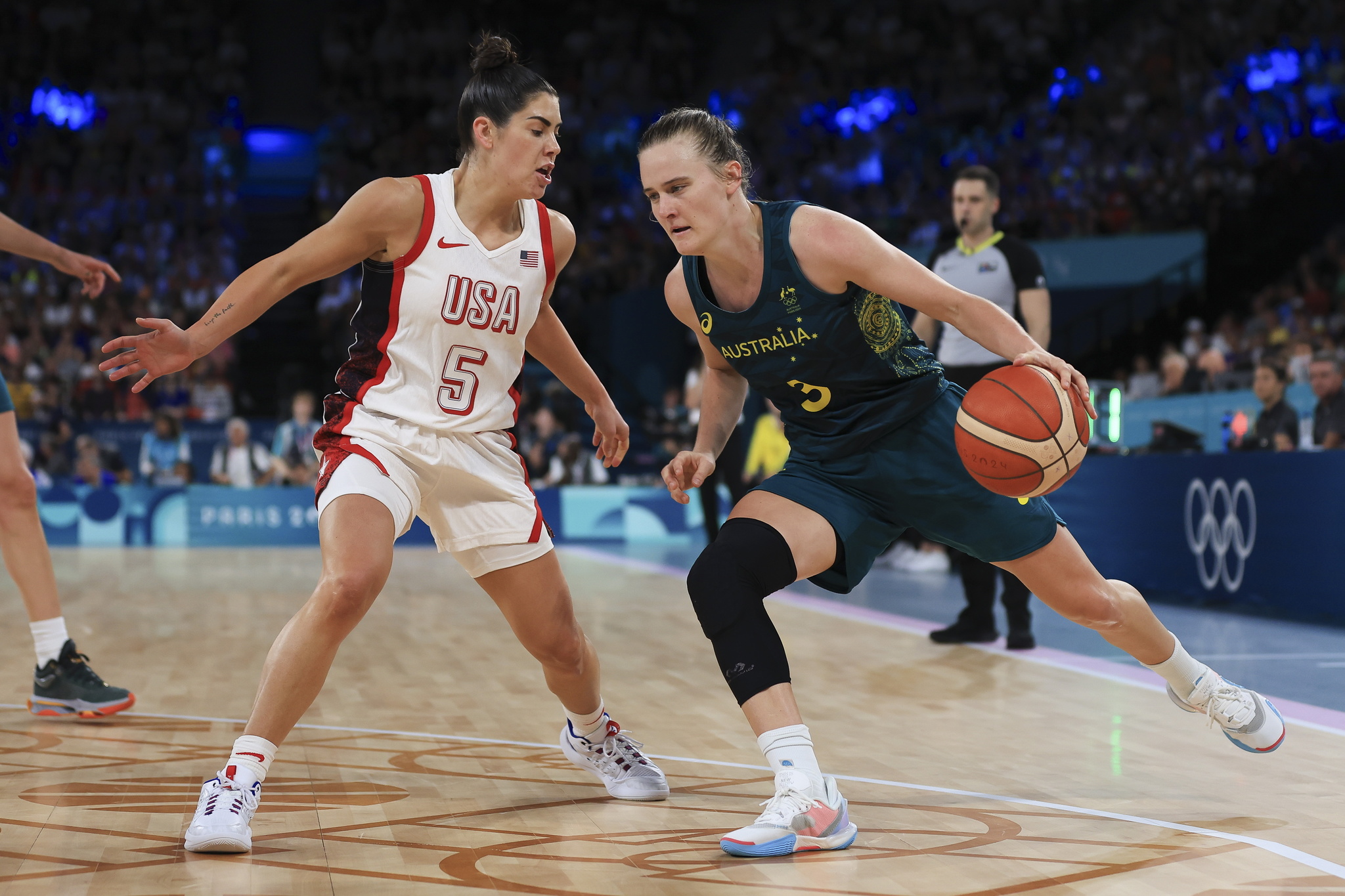 Kristy Wallace of Australia(R) in action against Kelsey Plum of the USA