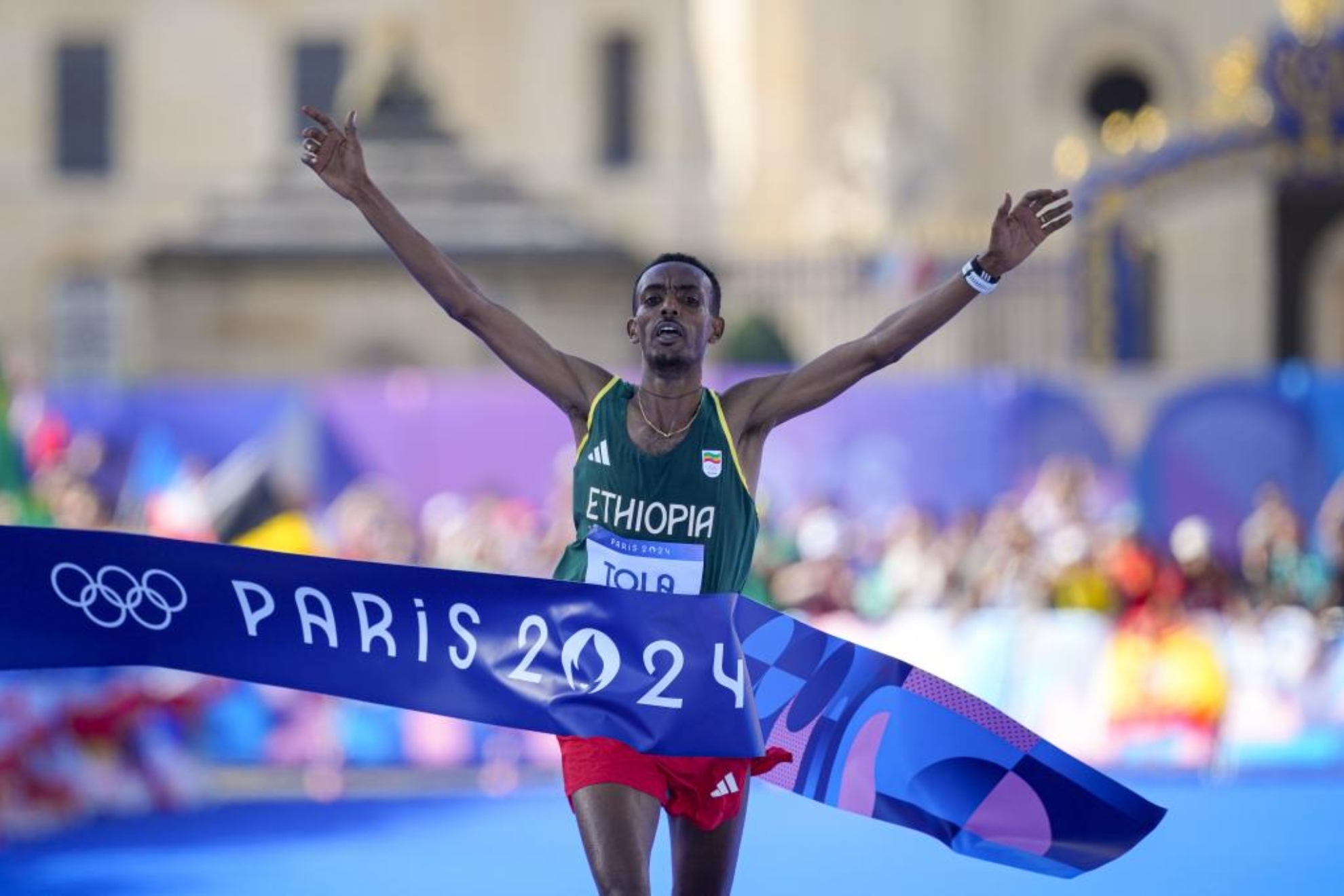 Ethiopias Tola wins Olympic gold in marathon he wasnt going to run