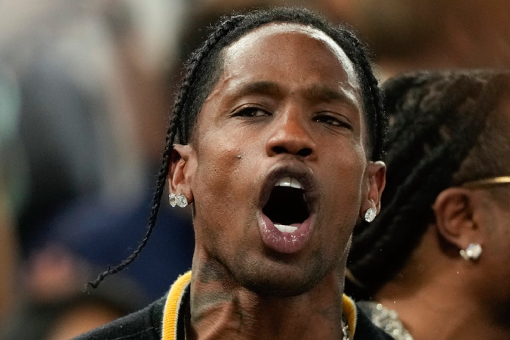 Travis Scott watches the Serbia vs United States game during a mens semifinals basketball game at Bercy Arena /