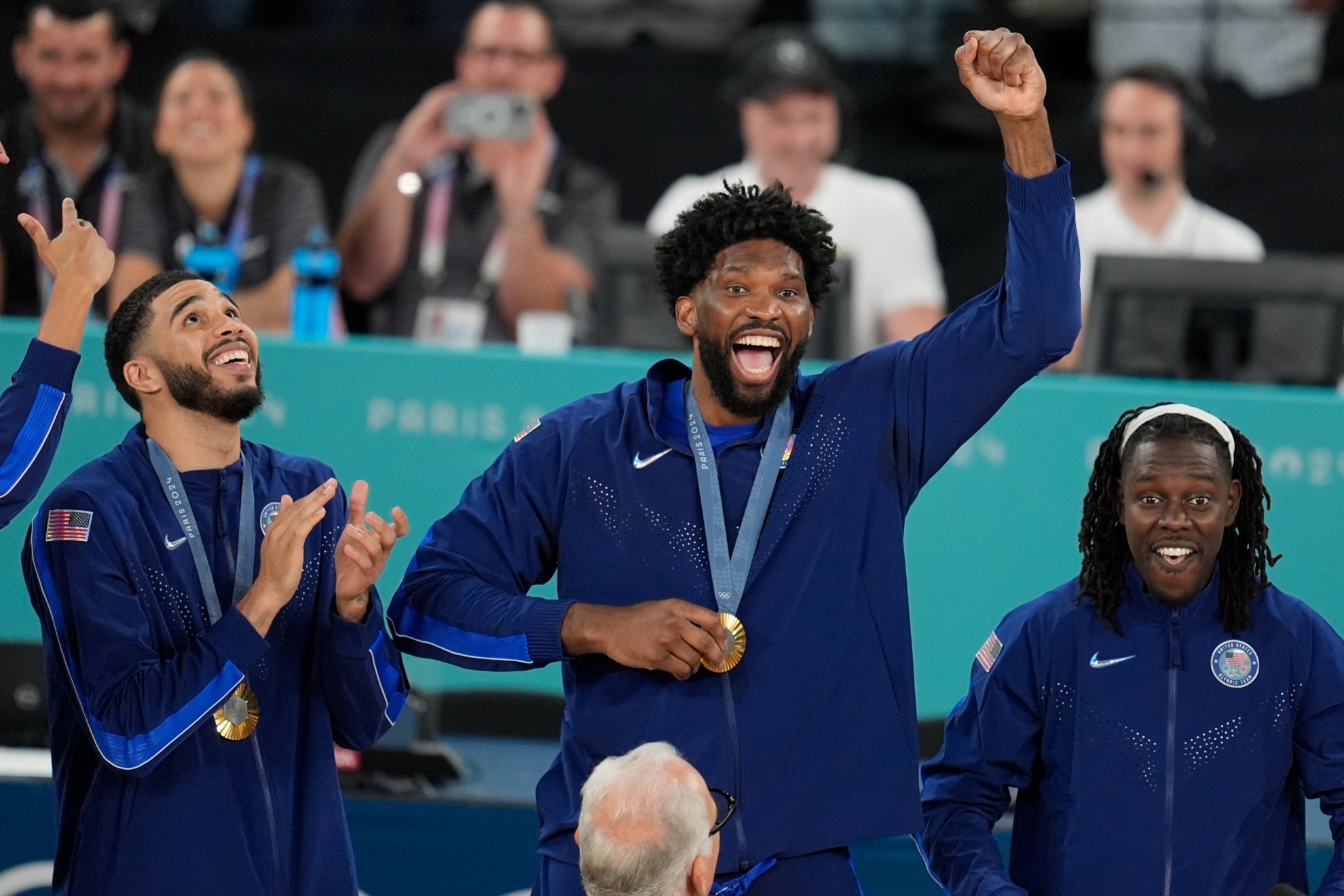 United States Joel Embiid (11) celebrates after winning a mens gold medal basketball game against France at Bercy Arena at the 2024 Summer Olympics, Saturday, Aug. 10, 2024, in Paris, France. (AP Photo/Michael Conroy)