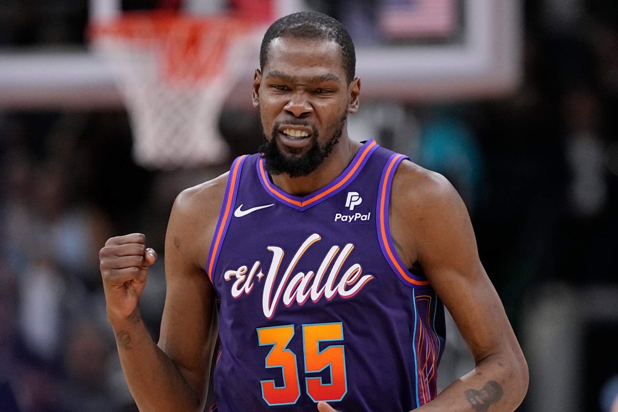 Phoenix Suns forward Kevin Durant (35) reacts after scoring against the San Antonio Spurs during the second half of an NBA basketball game in San Antonio, Monday, March 25, 2024. (AP Photo/Eric Gay)