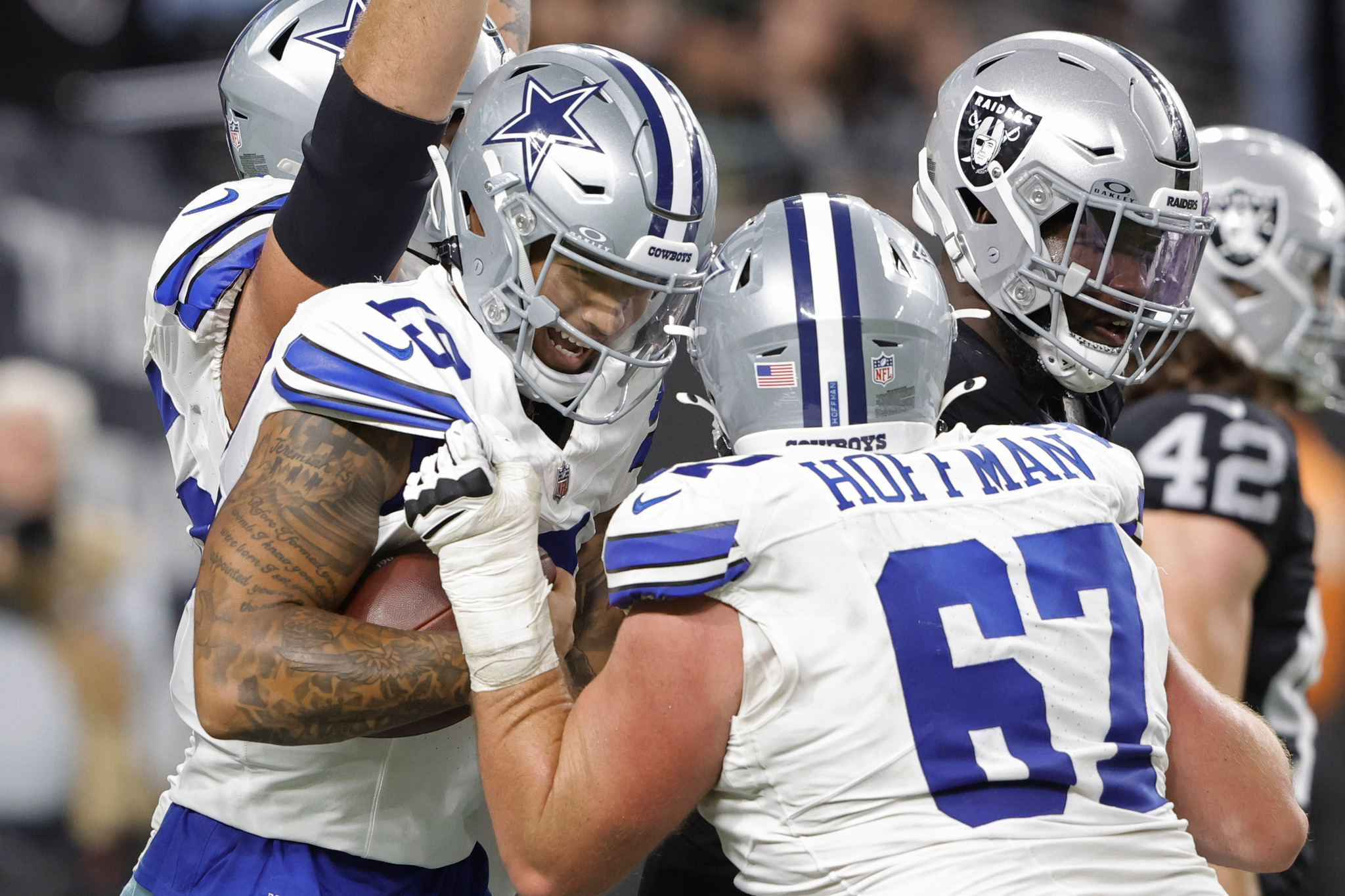 Dallas Cowboys quarterback Trey Lance (19) celebrates after scoring a touchdown against the Las Vegas Raiders