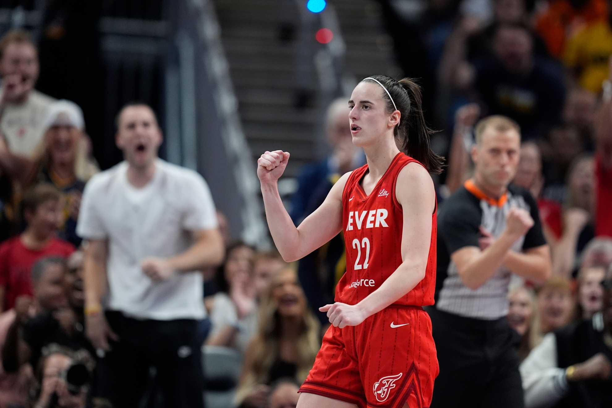 Indiana Fevers Caitlin Clark reacts during the second half of a WNBA basketball game against the Las Vegas Aces, Wednesday, Sept. 11, 2024, in Indianapolis.