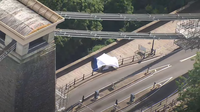 A police tent on Clifton Suspension Bridge, where suitcases containing what are believed to be body parts has been found