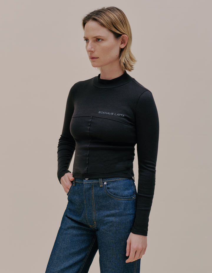 LAPPED BABY TURTLENECK IN BLACK