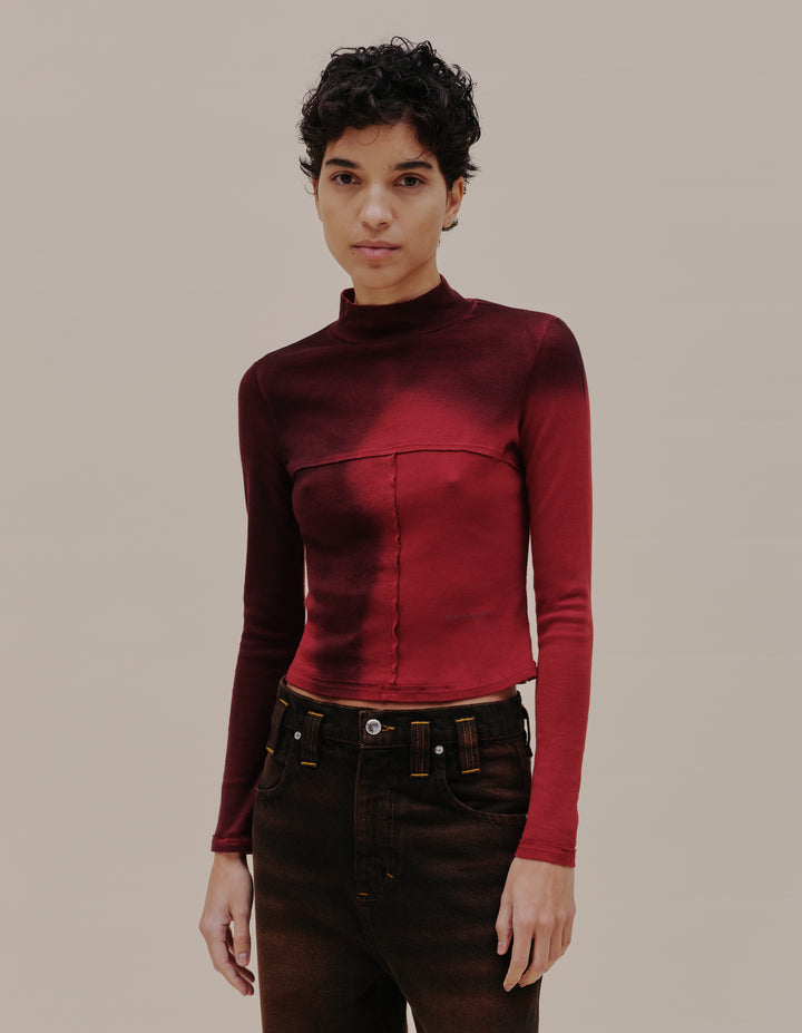 LAPPED BABY TURTLENECK IN MAROON BLUR