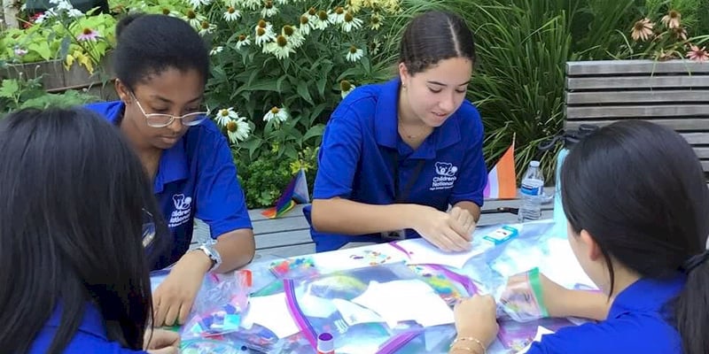 A group of young volunteers doing a group activity