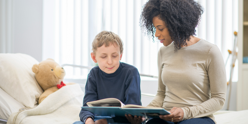 Woman reading to child