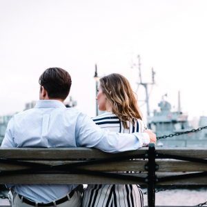 couple sitting on bench together