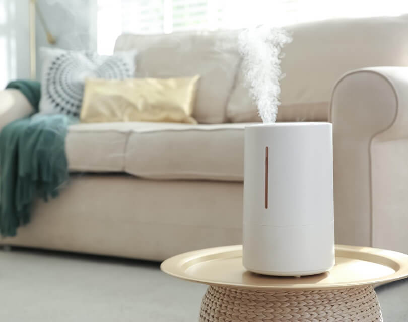 Air Quality Purifier siting on table in living room