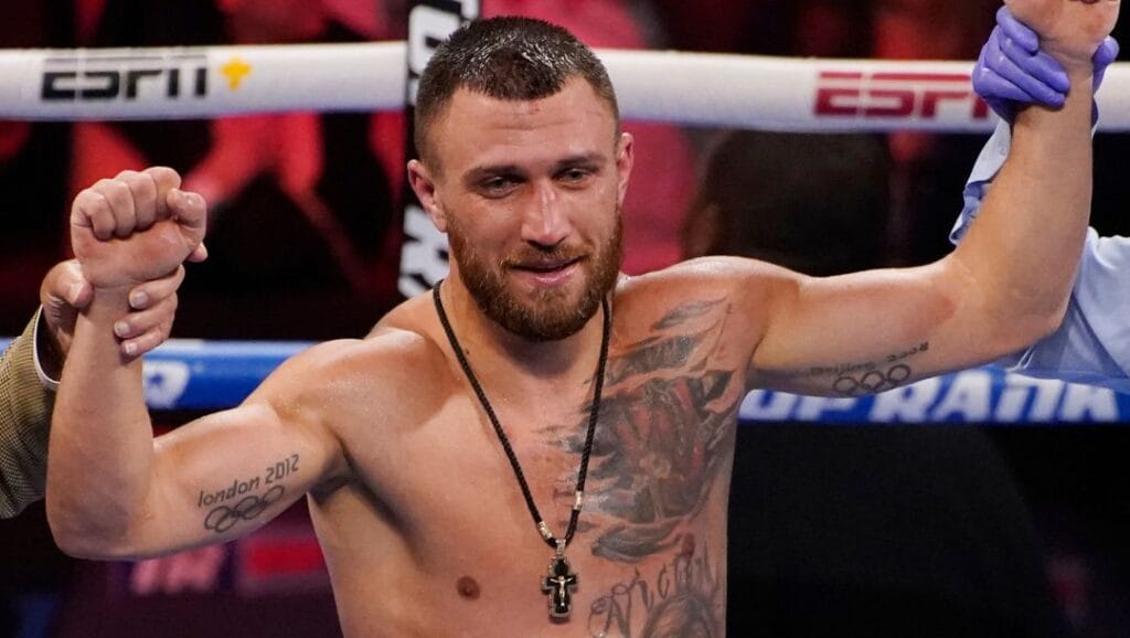 FILE -Vasiliy Lomachenko, of Ukraine, celebrates after defeating Masayoshi Nakatani, of Japan, by technical knockout.