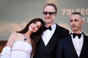 US actress Anne Hathaway, US director James Gray and US actor Jeremy Strong arrive for the screening of the film "Armageddon Time" during the 75th edition of the Cannes Film Festival in Cannes, southern France, on May 19, 2022.