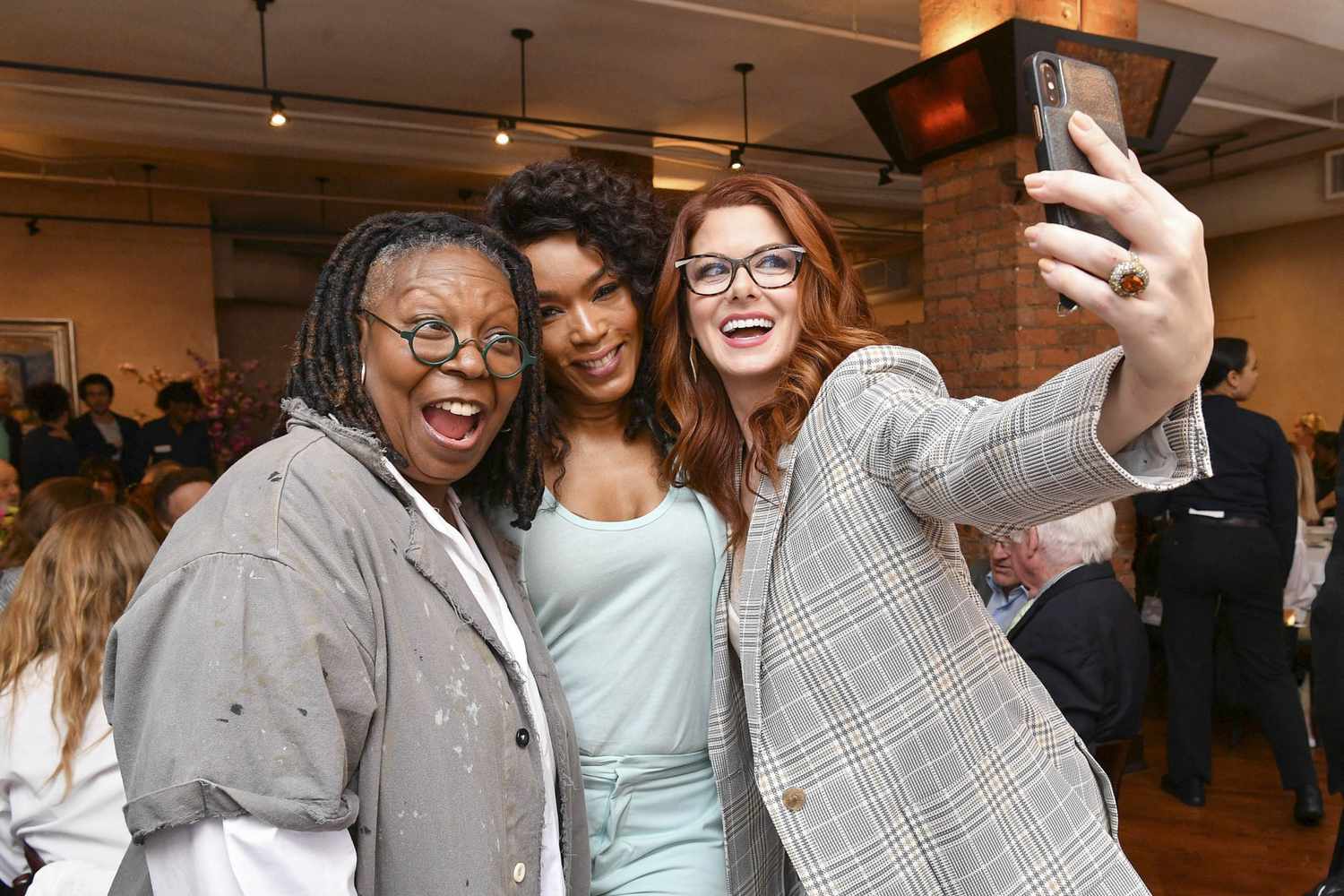 NEW YORK, NEW YORK - APRIL 25: (L-R) Whoopi Goldberg, Angela Bassett, and Debra Messing attend the 2019 Tribeca Film Festival Jury Lunch at Tribeca Grill Loft on April 25, 2019 in New York City. (Photo by Dia Dipasupil/Getty Images for Tribeca Film Festival)