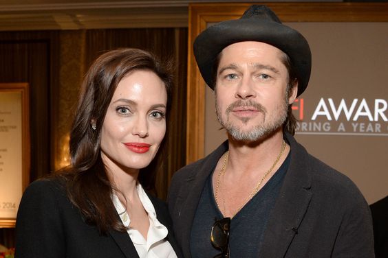 Angelina Jolie (L) and Brad Pitt attend the 15th Annual AFI Awards Luncheon at Four Seasons Hotel Los Angeles at Beverly Hills on January 9, 2015 in Beverly Hills, California. 