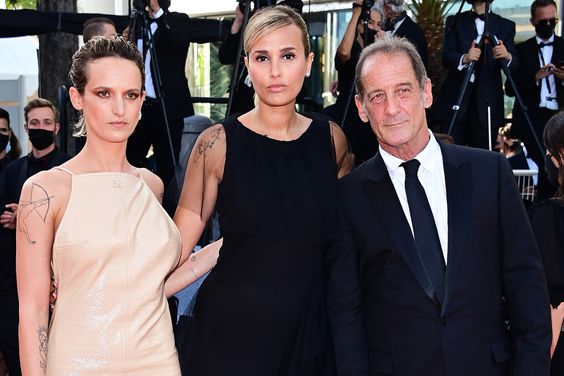 Agathe Rousselle, Julia Ducournau and Vincent Lindon attend the final screening of "OSS 117: From Africa With Love" and closing ceremony during the 74th annual Cannes Film Festival on July 17, 2021 in Cannes, France.