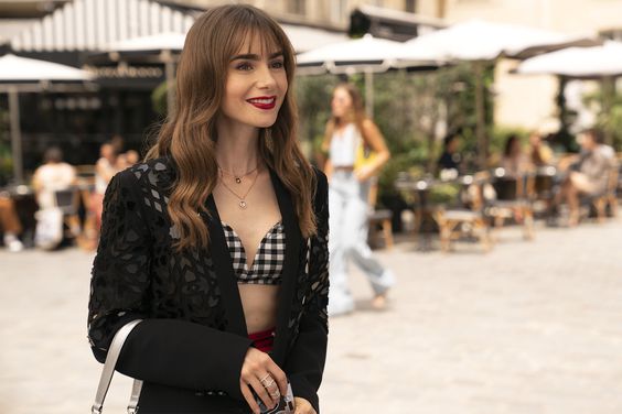 Emily In Paris. Lily Collins as Emily in episode 305 of Emily In Paris. Cr. Stéphanie Branchu/Netflix © 2022