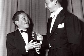 Bobby Driscoll is presented by Donald O'Connor with special Academy Award at age 12 as the outstandi