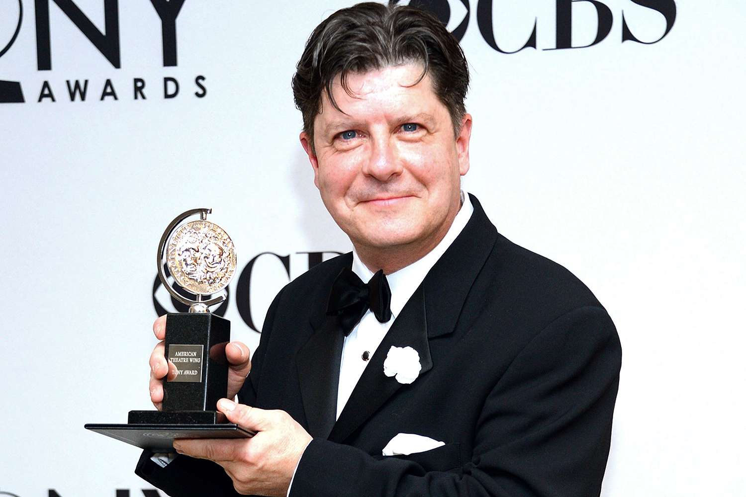 Michael McGrath poses in the 66th Annual Tony Awards press room at The Beacon Theatre on June 10, 2012 in New York City.