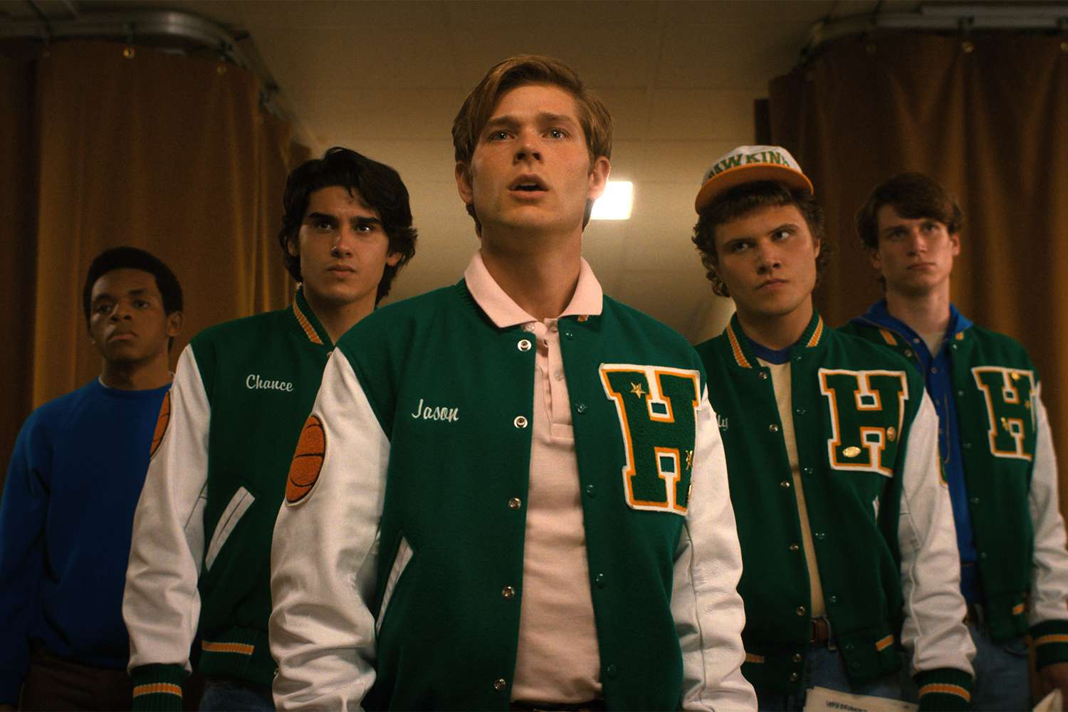 STRANGER THINGS (center) Mason Dye as Jason Cr. Courtesy of Netflix © 2022