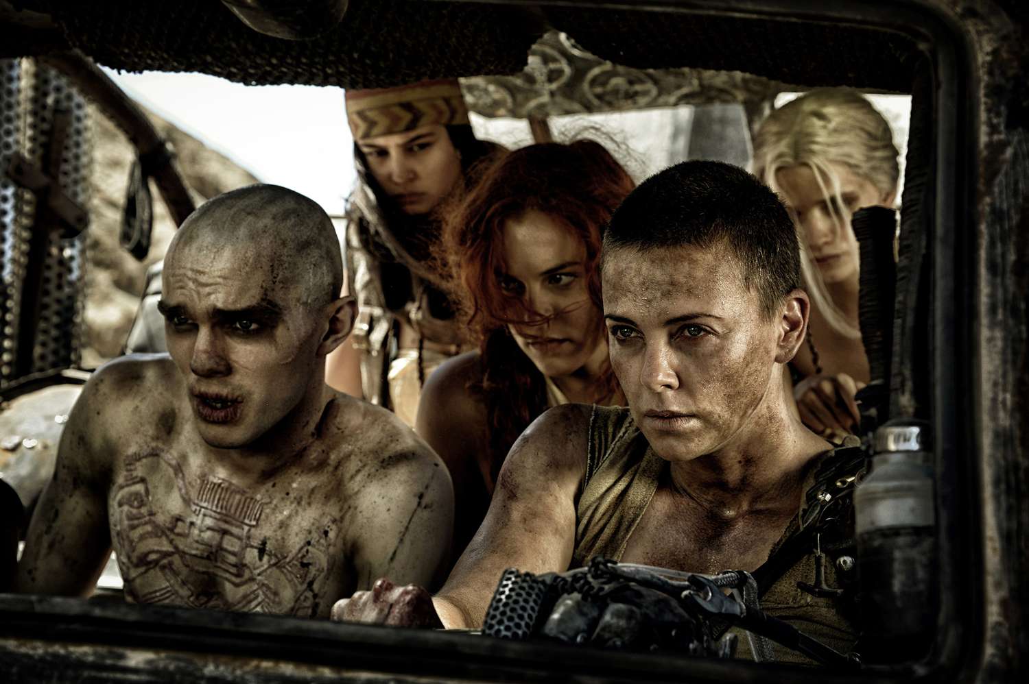 MAD MAX: FURY ROAD, l-r: Nicholas Hoult, Courtney Eaton, Riley Keough, Charlize Theron, Abbey Lee Kershaw, 2015