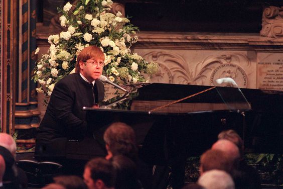 Sir Elton John signing 'Candle In The Wind' at the funeral of Diana, Princess of Wales