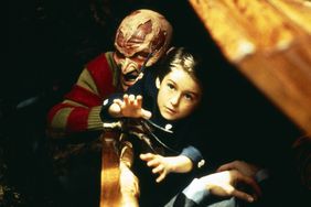 Robert Englund and Miko Hughes in 'Wes Craven's New Nightmare'