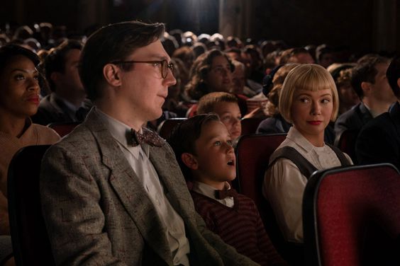 (from left) Burt Fabelman (Paul Dano), younger Sammy Fabelman (Mateo Zoryan Francis-DeFord) and Mitzi Fabelman (Michelle Williams) in The Fabelmans, co-written and directed by Steven Spielberg.