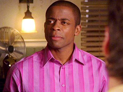 Psych, Dule Hill | Somehow, Gus manages to pull off wearing tops that could, in other countries, be called chemises. Or, in this country, be found on contestants on