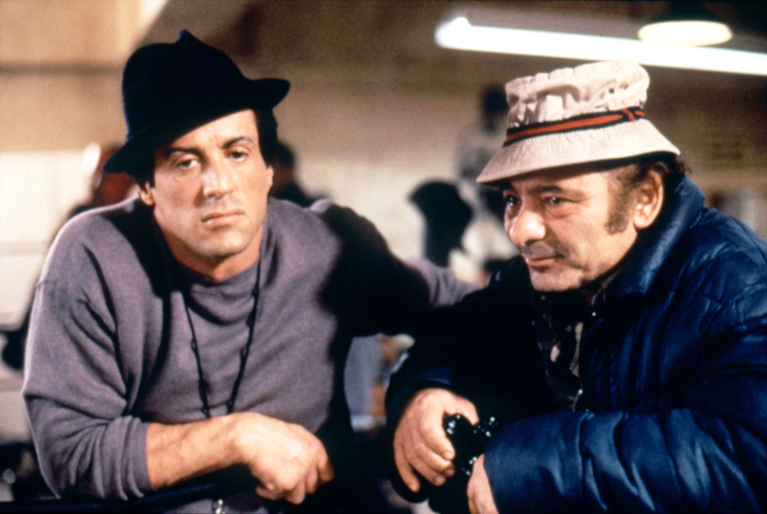 American actor Burt Young with actor and screenwriter Sylvester Stallone on the set of Rocky V directed by John G. Avildsen. (Photo by Sunset Boulevard/Corbis via Getty Images)