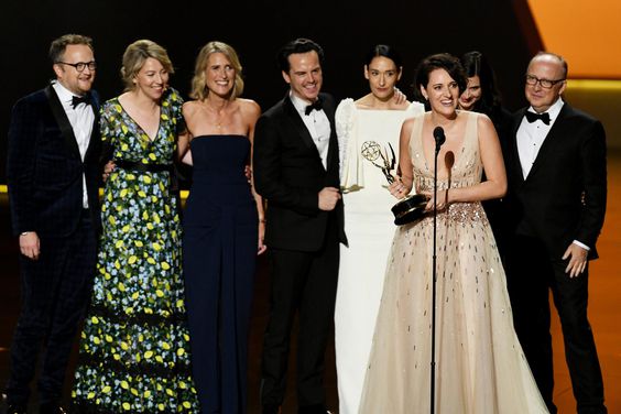 Phoebe Waller-Bridge (speaking) and fellow cast and crew members of 'Fleabag' accept the Outstanding Comedy Series award