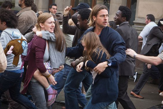 Mireille Enos, Sterling Jerins, Abigail Hargrove, and Brad Pitt in 'World War Z'