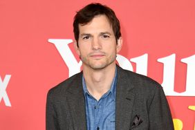 Ashton Kutcher arrives for the World Premiere Of Netflix's "Your Place Or Mine" held at Regency Village Theatre on February 02, 2023 in Los Angeles, California. 