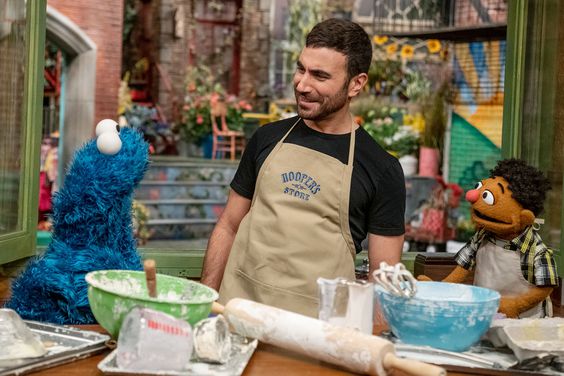 Cookie Monster, Brett Goldstein, and Tamir on 'Sesame Street'