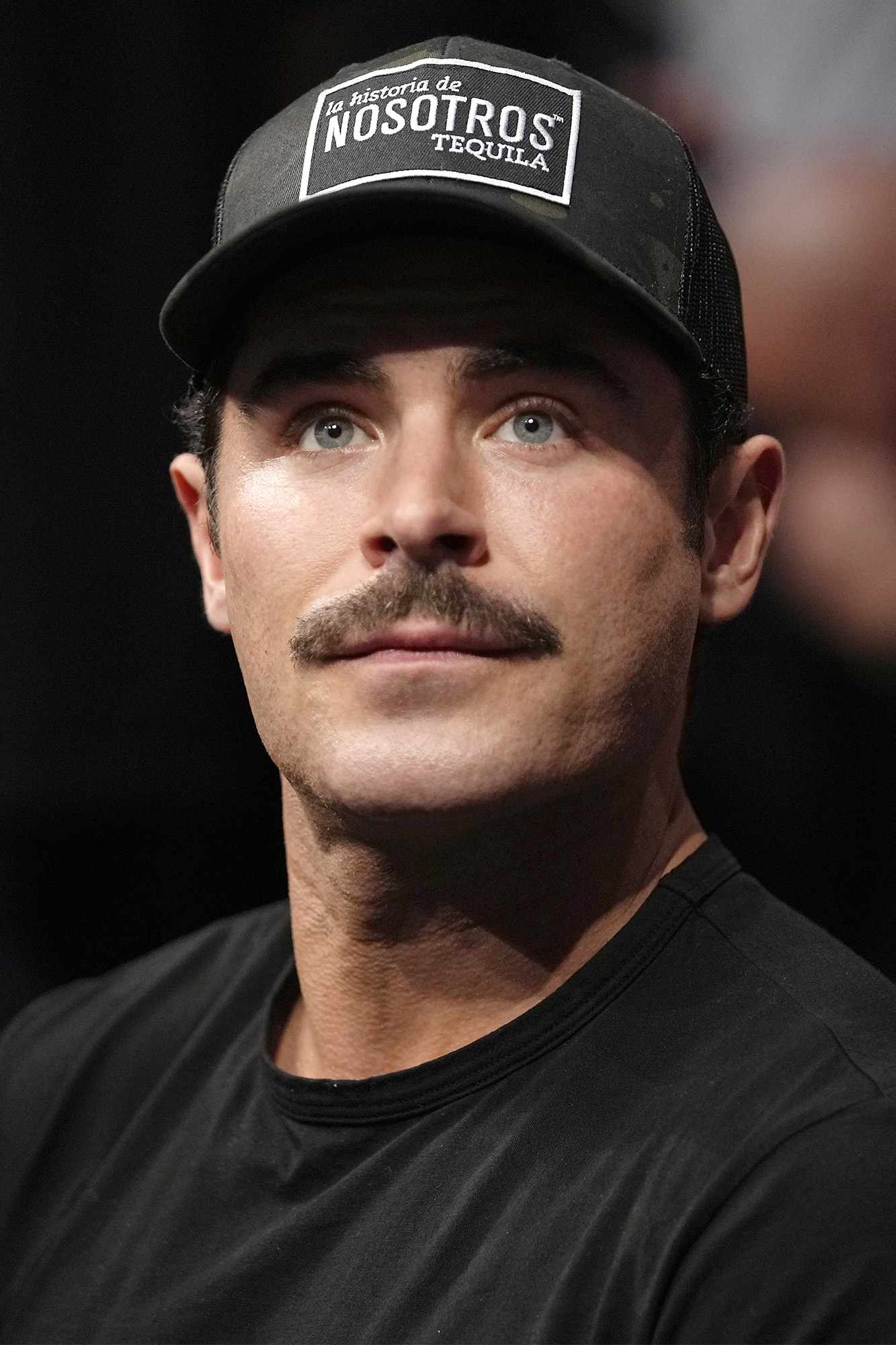 LAS VEGAS, NEVADA - DECEMBER 11: Zac Efron sits in the audience during the UFC 269 on December 11, 2021 in Las Vegas, Nevada. (Photo by Jeff Bottari/Zuffa LLC)