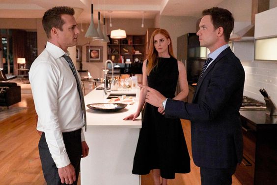 SUITS -- "If the Shoe Fits" Episode 905 -- Pictured: (l-r) Gabriel Macht as Harvey Specter, Sarah Rafferty as Donna Paulsen, Patrick J. Adams as Mike Ross -- (Photo by: Shane Mahood/USA Network)