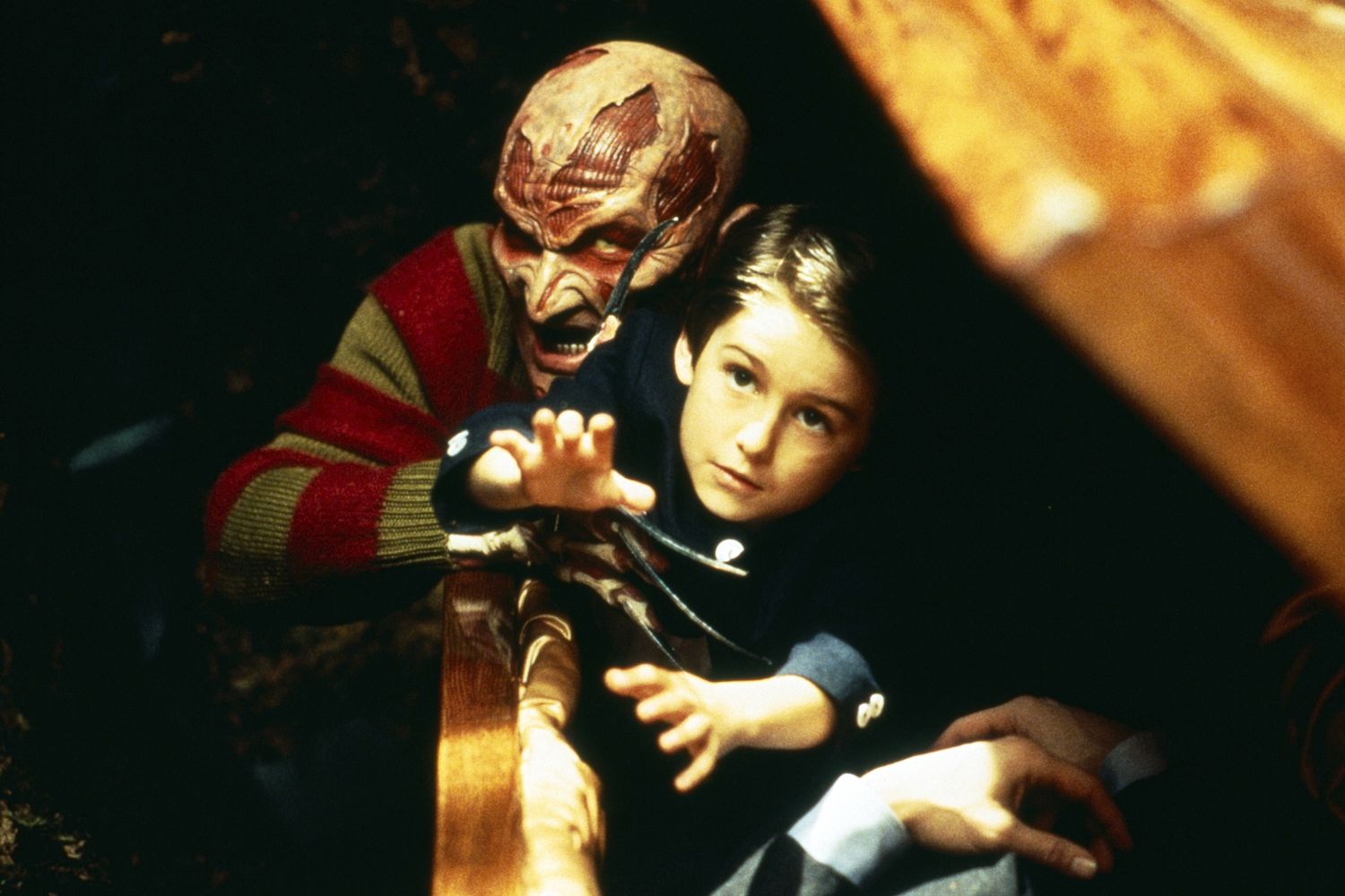 Robert Englund and Miko Hughes in 'Wes Craven's New Nightmare'