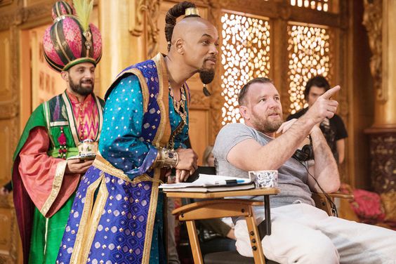 ALADDIN, from left: Will Smith(center), director Guy Ritchie, on-set, 2019.